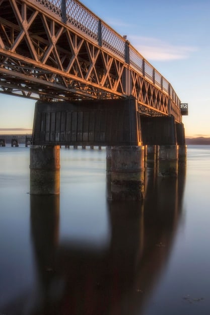 A breathtaking view of Edmund Pettus Bridge, Selma, Alabama, with the Alabama River flowing beneath it. The image captures the bridge's historical significance as the site of 