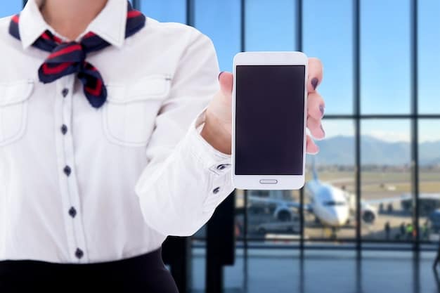 A close-up of a mobile phone displaying an airline app showing available upgrade options and prices, highlighting upgrade opportunities.