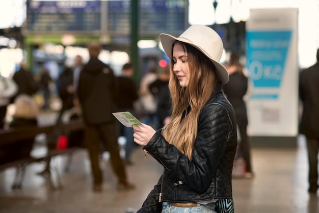 A traveler presenting their Priority Pass card at the entrance of an airport lounge.