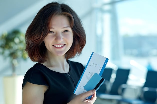 A person smiling and holding a boarding pass, showing 'Business Class' printed on it, indicating an upgrade achieved through loyalty program perks.
