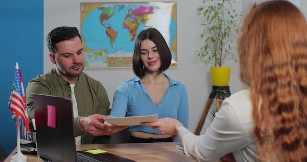 A brightly lit office scene showing a travel agent assisting a young couple with their travel insurance options. The agent is pointing at a computer screen displaying various policy options.