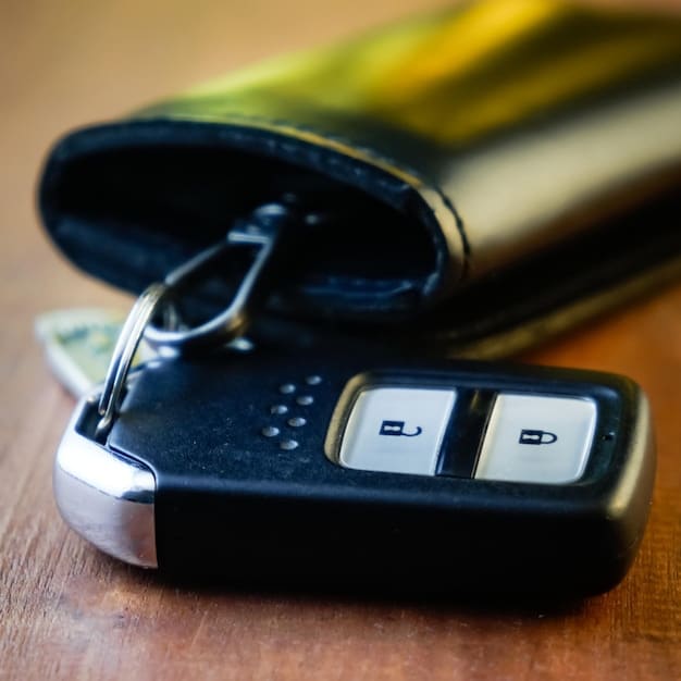 A close-up of a car key with an airline loyalty program keychain, illustrating using miles for car rentals to Unlock Hidden Value: Using Airline Miles for Hotel Stays and Car Rentals, creating budget-friendly travel solutions.
