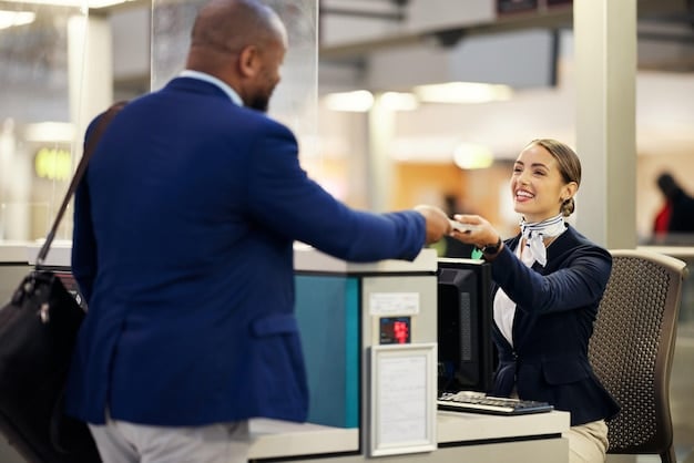 An airline employee at a baggage claim service desk is assisting a passenger with filling out a lost luggage claim form. The employee is pointing to a section of the form while explaining something. The passenger is looking attentively and holding their boarding pass in one hand. This shows the immediate steps to deal with lost luggage and file your claim within 24 hours for faster compensation.