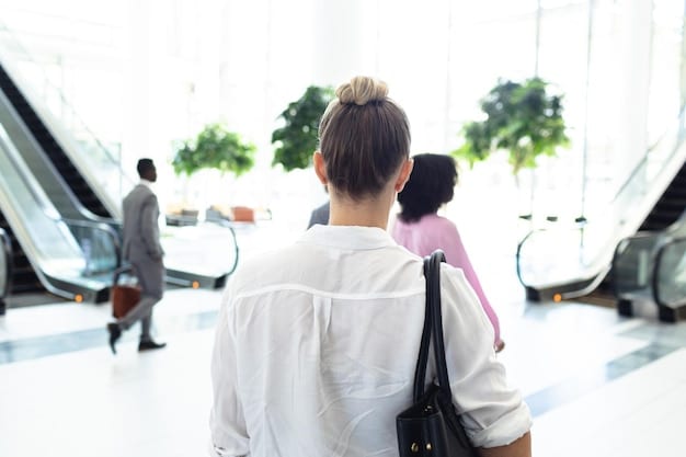 A close-up shot of an airport car rental counter with several people waiting in line, looking tired and slightly frustrated. The background is blurred, focusing on the congestion and the sense of impatience. The image represents the typical hassle associated with airport car rentals.