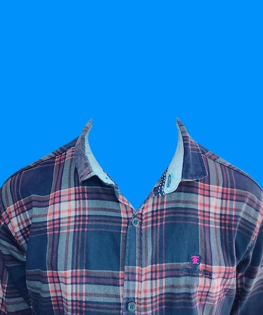 A split image showing a rolled dress shirt with noticeable wrinkles on one side and a neatly folded dress shirt with minimal wrinkles on the other side. The background should be a neutral color, and the lighting should be even to highlight the differences in wrinkling. Emphasis should be on the comparison of wrinkle levels, related to the 'Pack Like a Pro: The Rolling vs. Folding Debate (and Which One Saves Space)'.