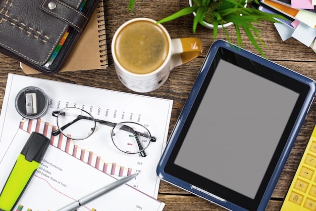 A detailed table showing a budget plan and credit scores on a digital tablet, alongside a calculator and a pen, emphasizing financial planning.