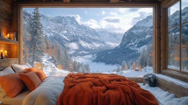 A cozy hotel room with a view of a snow-covered mountain range during what would typically be considered the off-season. The room is inviting and suggests affordable luxury due to Off-Season Travel: Save Up to 40% by Traveling During Shoulder Seasons.