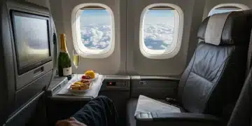 Traveler enjoying first class luxury on an international flight